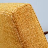 Vintage amber armchair Hermes designed by H. Lis