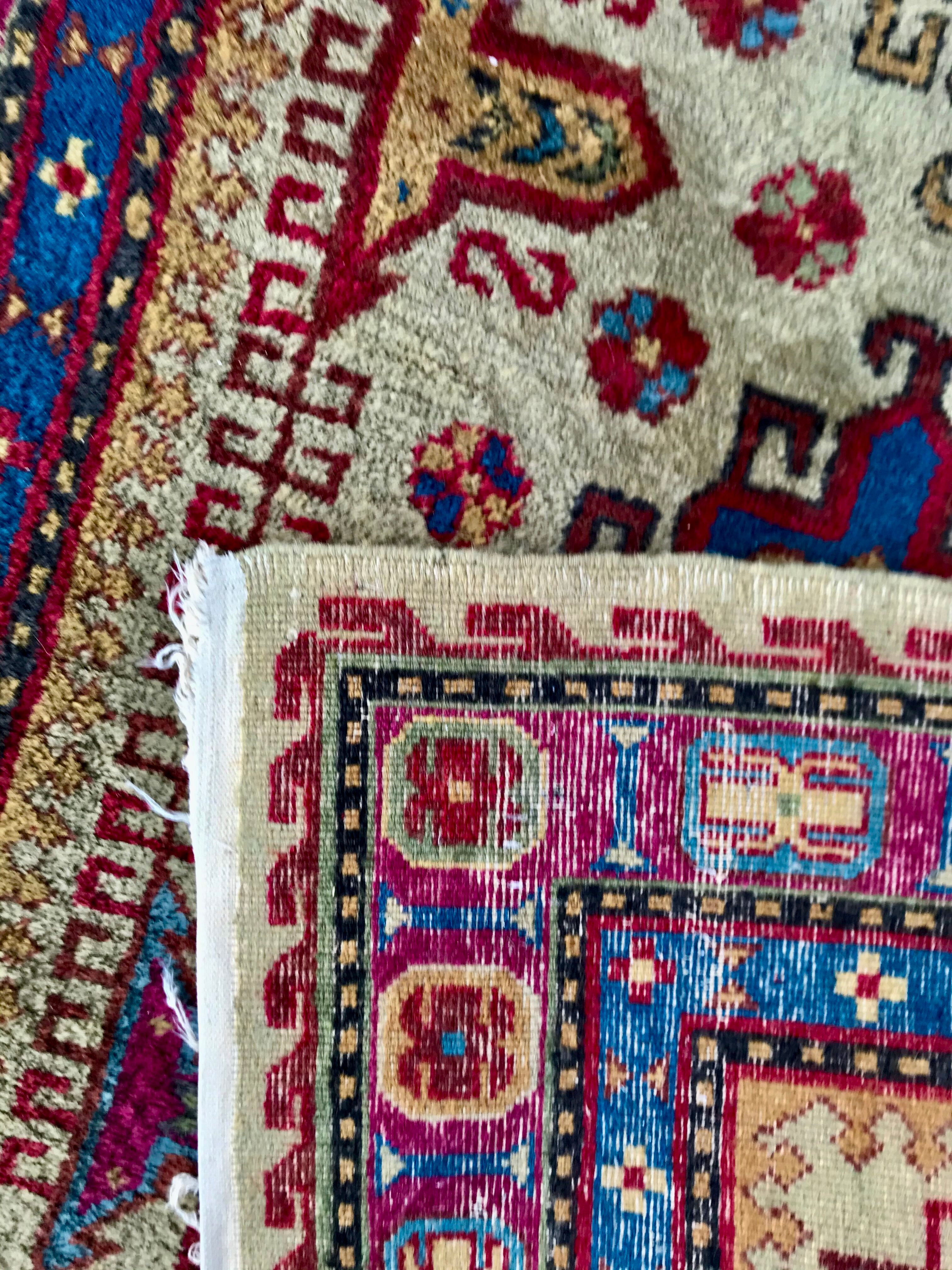 Tapis persan ancien noué main