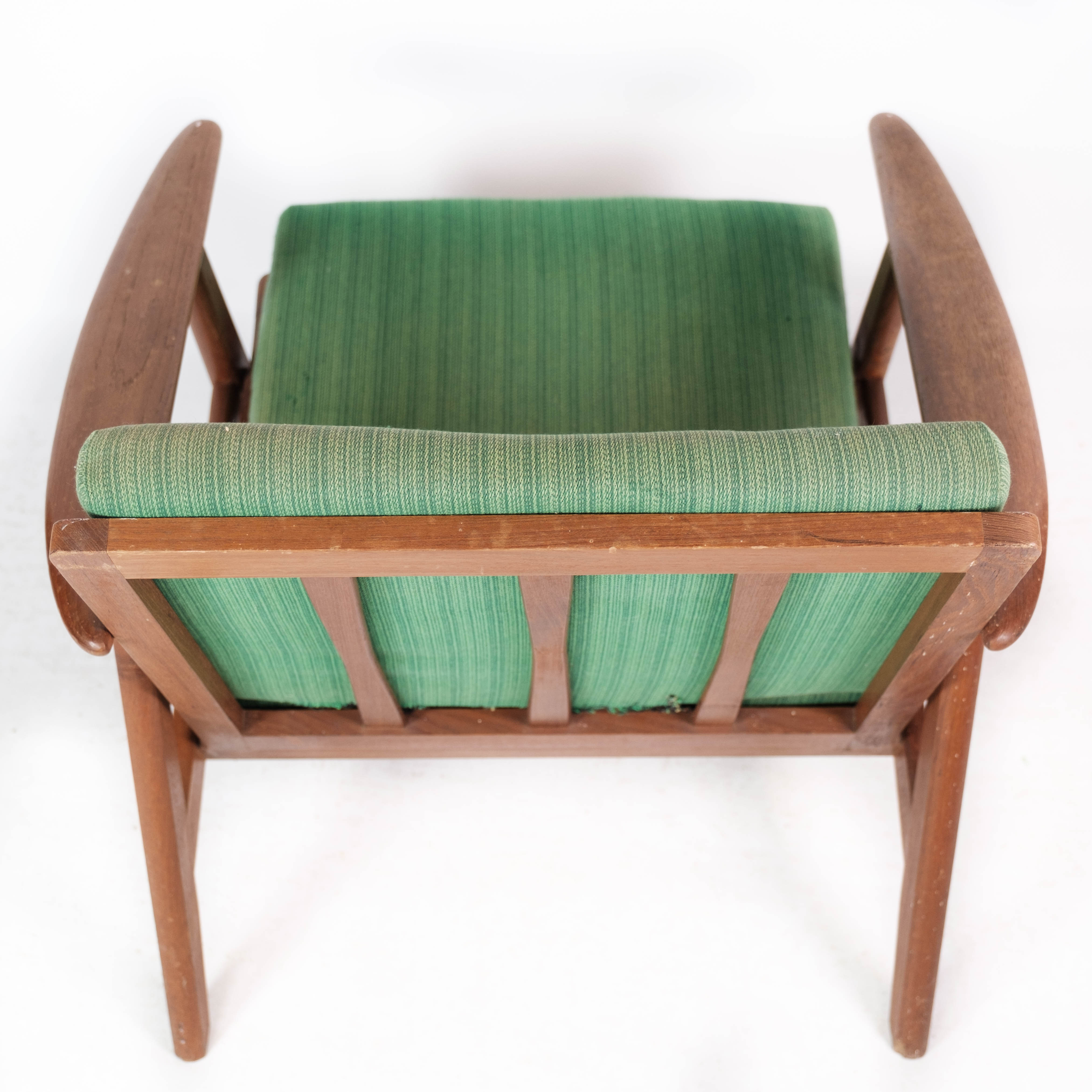 Easy chair in teak and with green upholstery of Danish design, 1960s