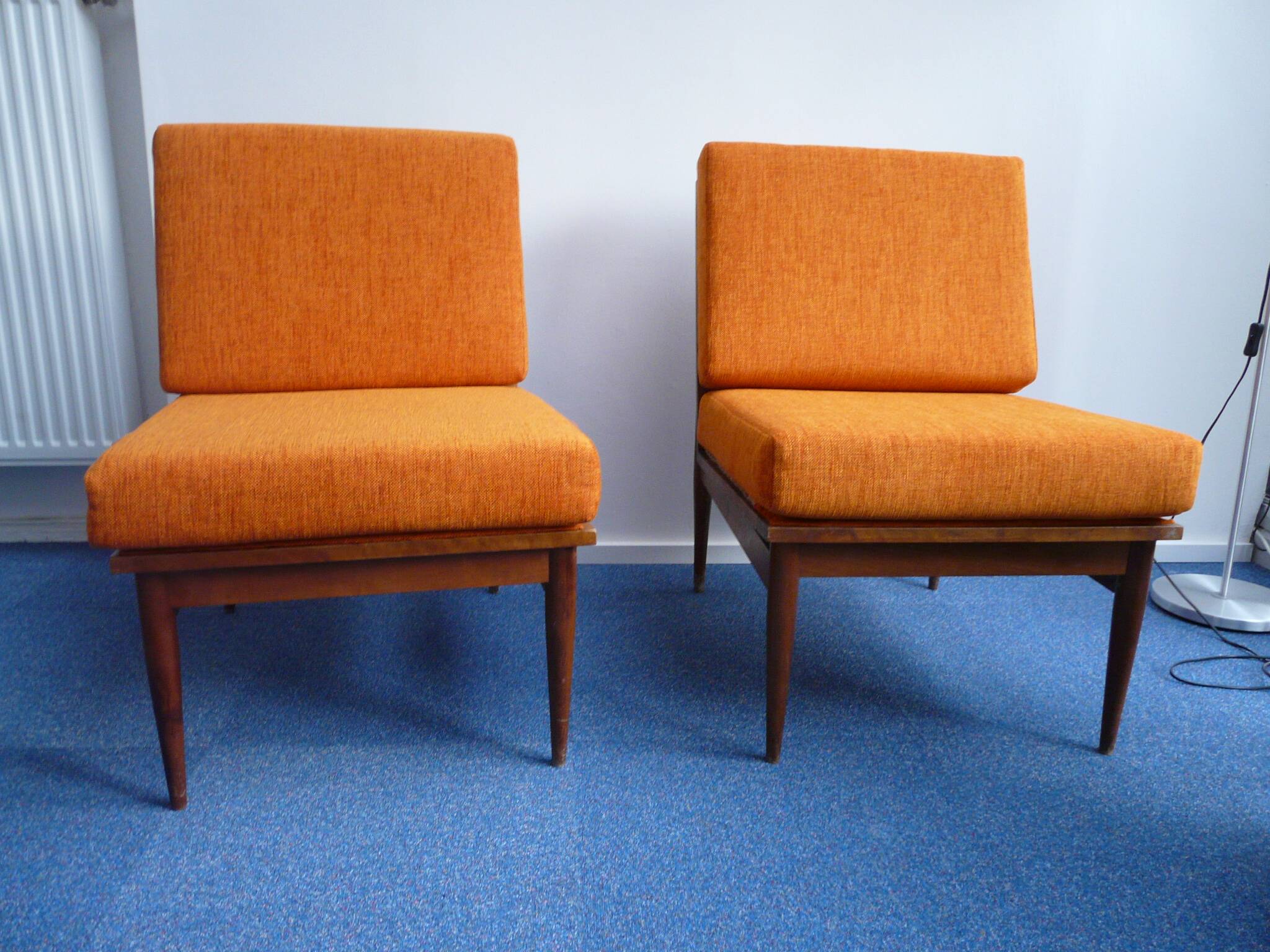 vintage orange armchairs