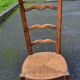 Chaise basse paillee dite chauffeuse