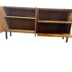 Vintage wooden sideboard with black steel legs.