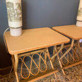 A pair of rattan bedside tables.