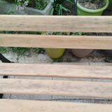 Garden bench with old cast iron legs