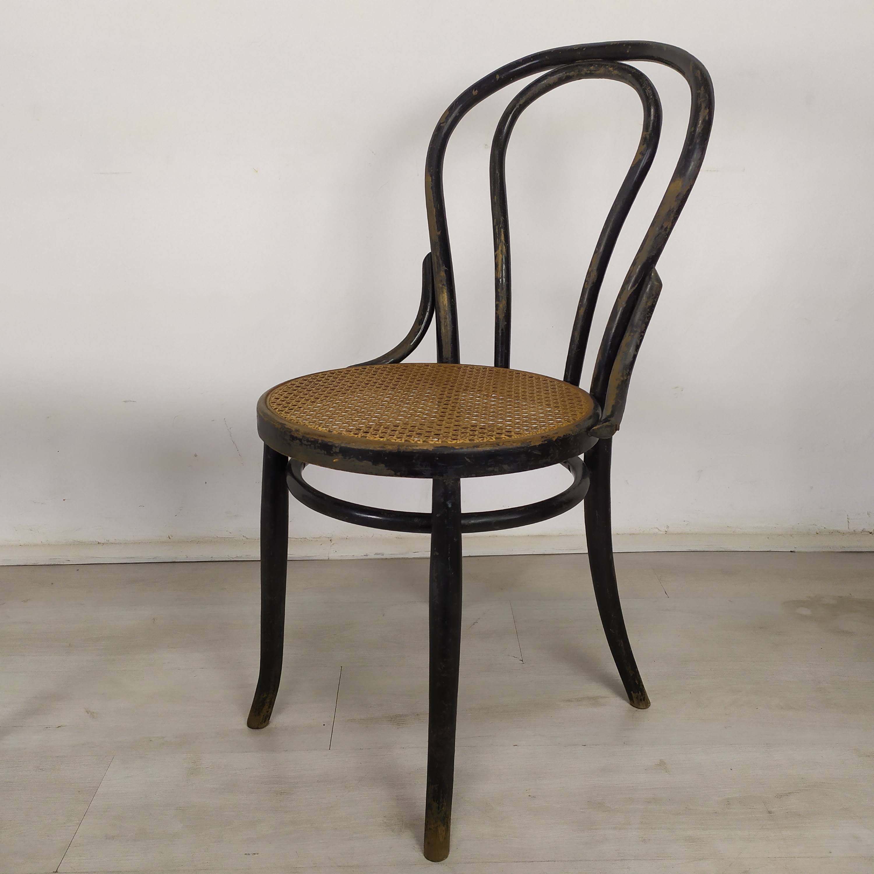 Black canned bistro chairs