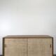 Modernist sideboard in oak with rattan doors.