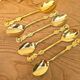Golden metal spoons