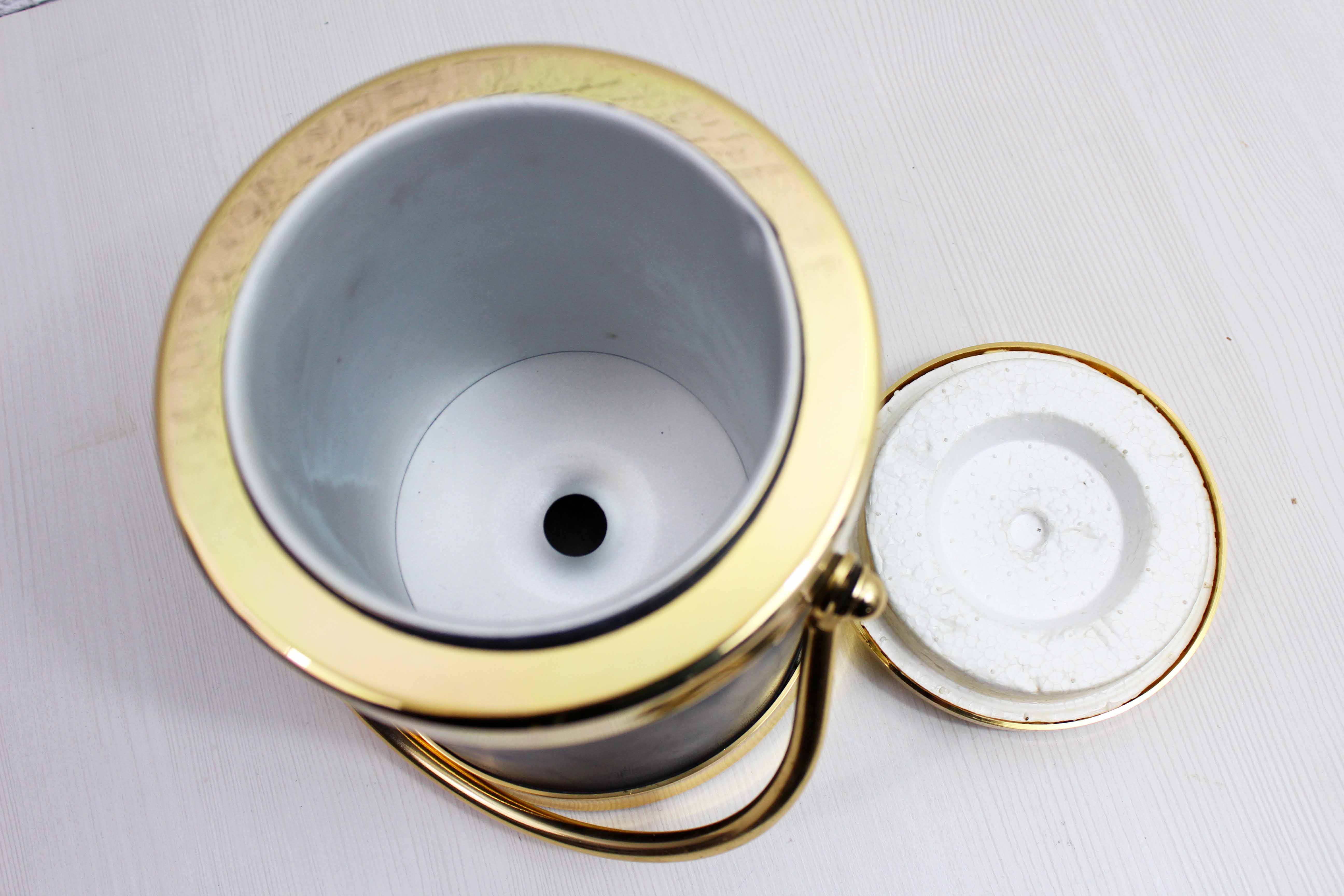 Vintage leather and brass ice bucket