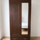 Rustic handcrafted wooden wardrobe with mirror