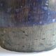 Ceramic bottle vase with a fish signature to be identified.