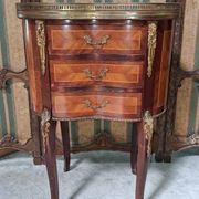 Lady's demi-lune commode in Louis XV style with marquetry and gilded bronze.