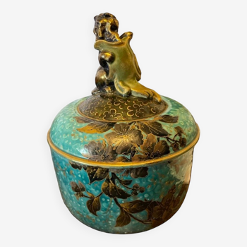 Asian plant pot decorated with lion and flowers