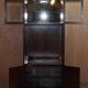 Henredon multimedia furniture military campaign with sliding TV stand and double socket.