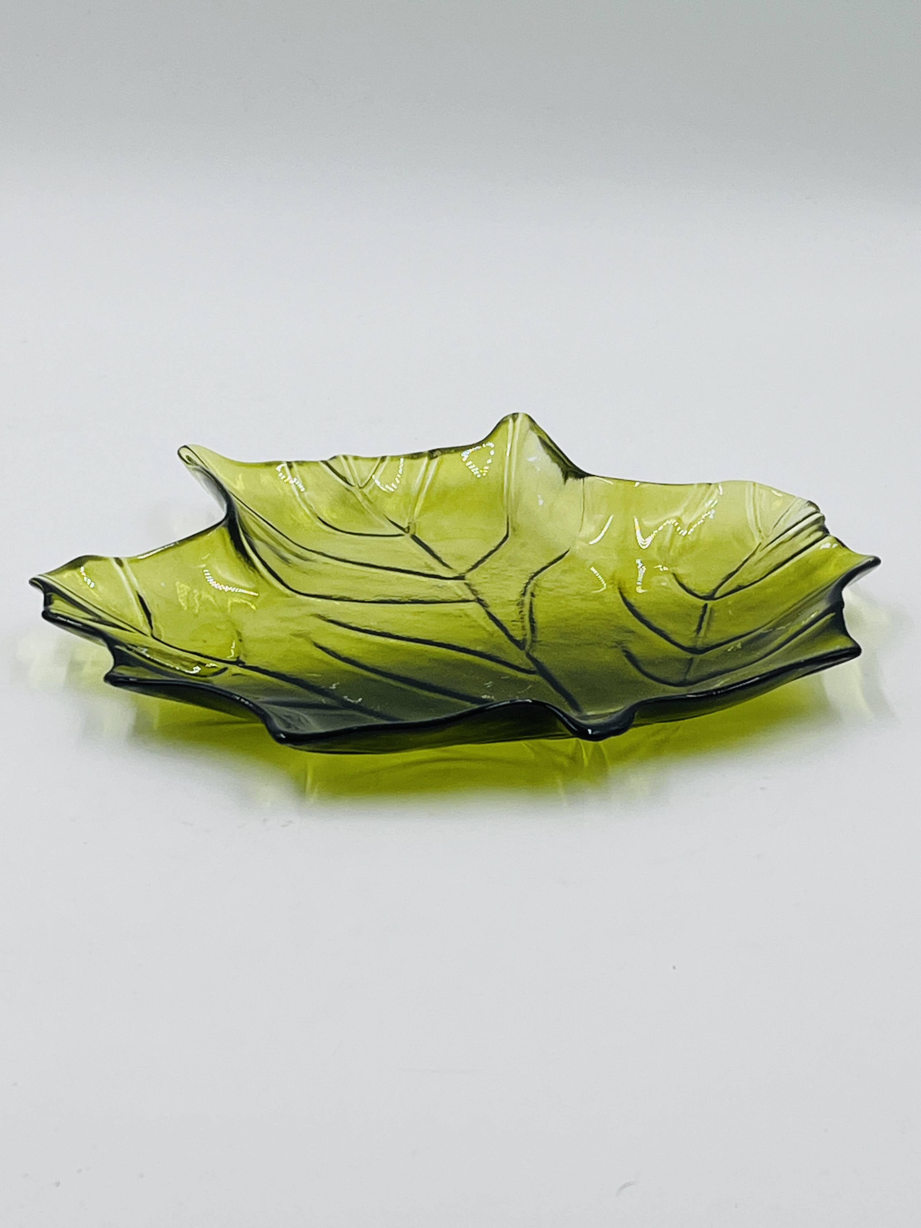 Vintage green glass leaf catchall from the 1970s.