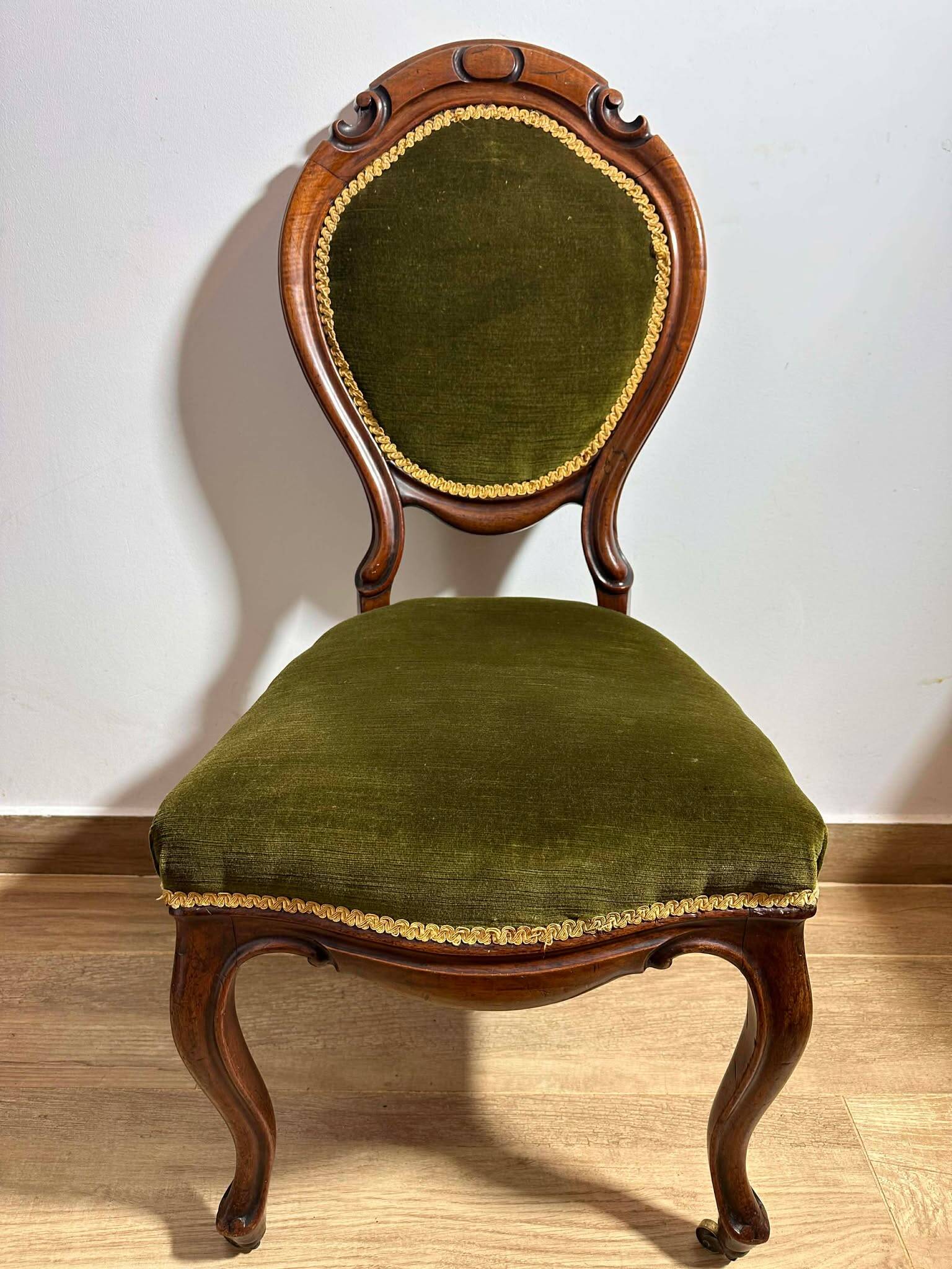 A pair of antique upholstered side chairs/Victorian balloon-back