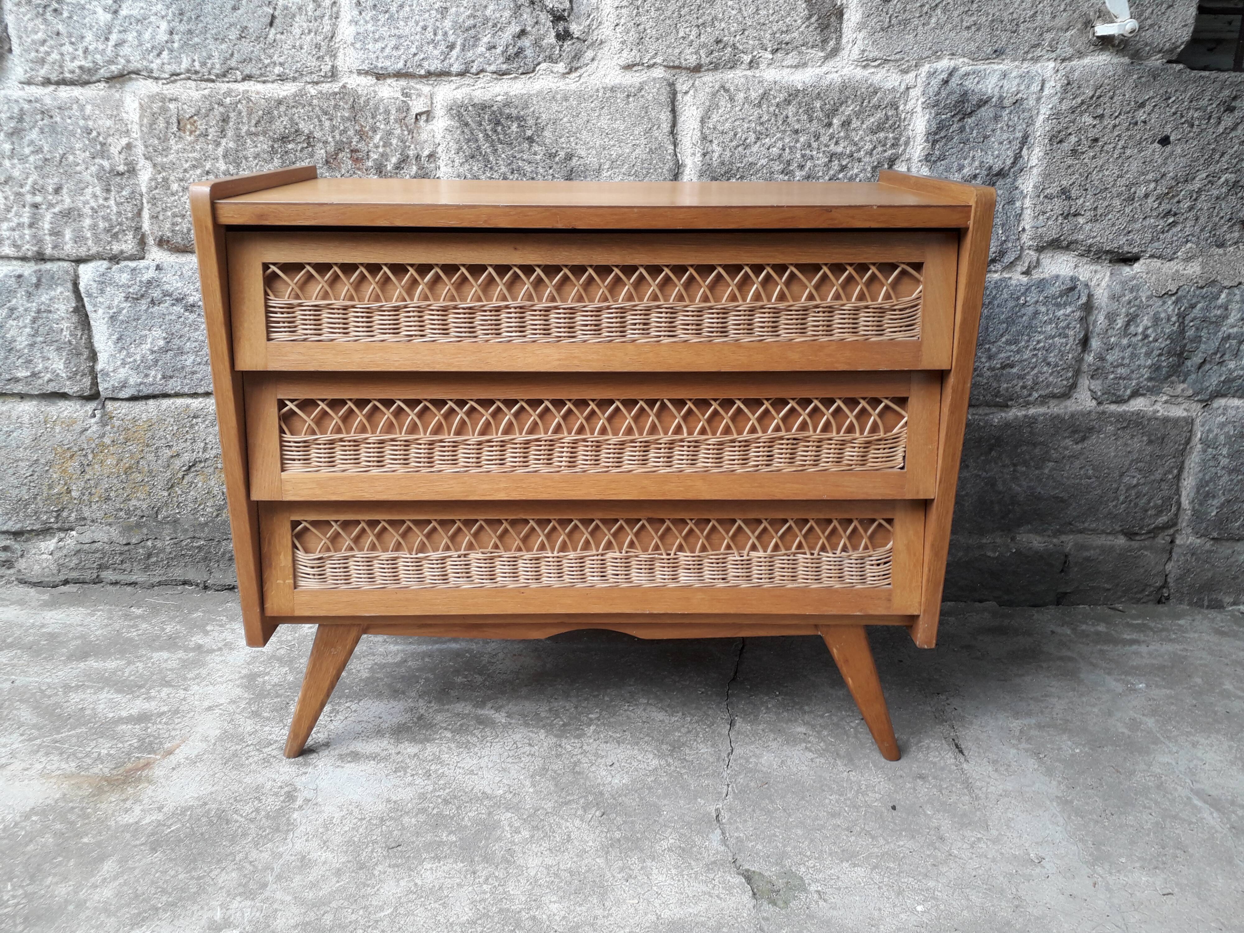 Vintage chest of drawers in rattan compass feet