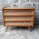 Commode vintage en rotin pieds compas