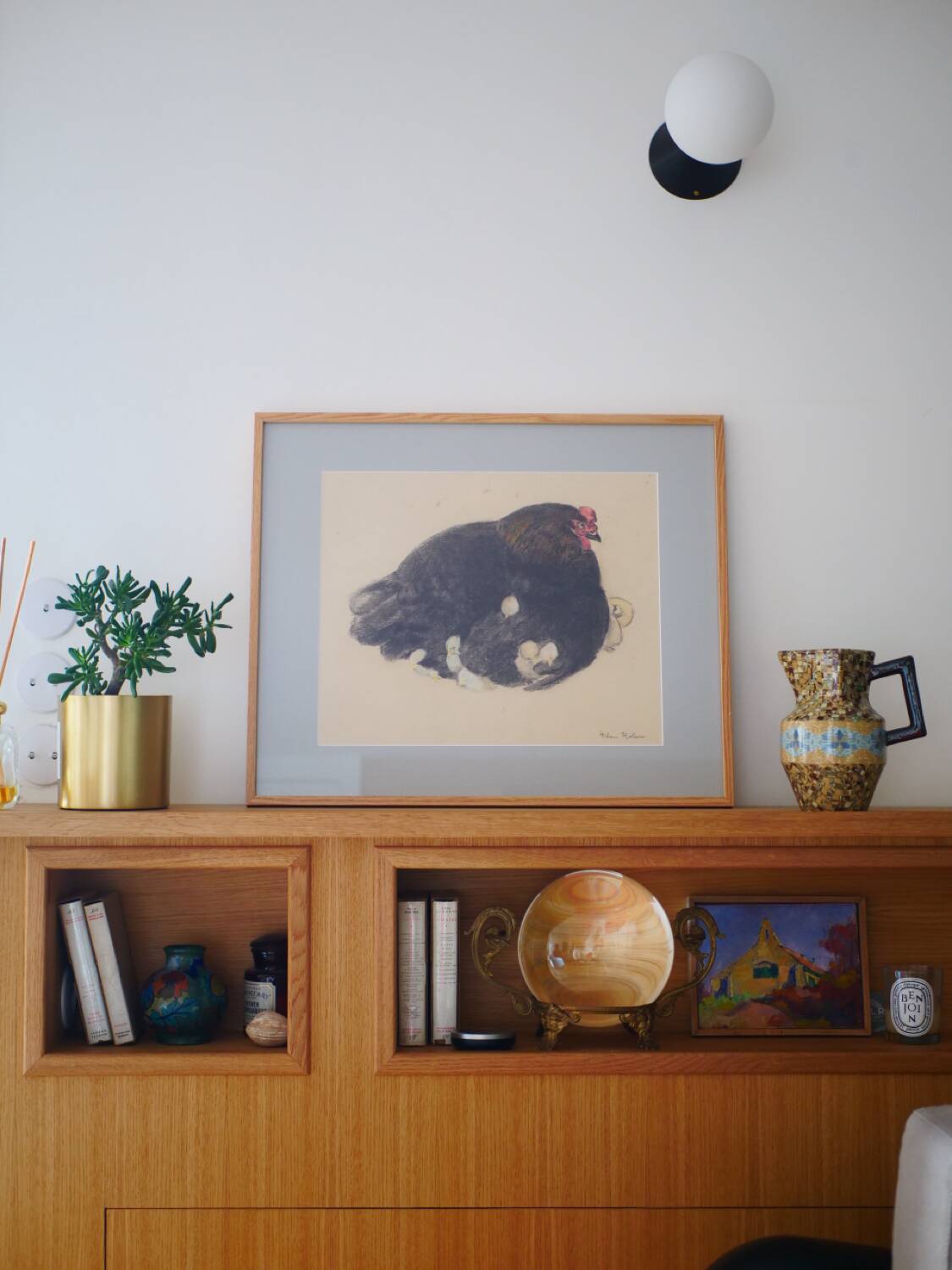 Black hen and her chicks, pastel on paper signed Hélène Rivière