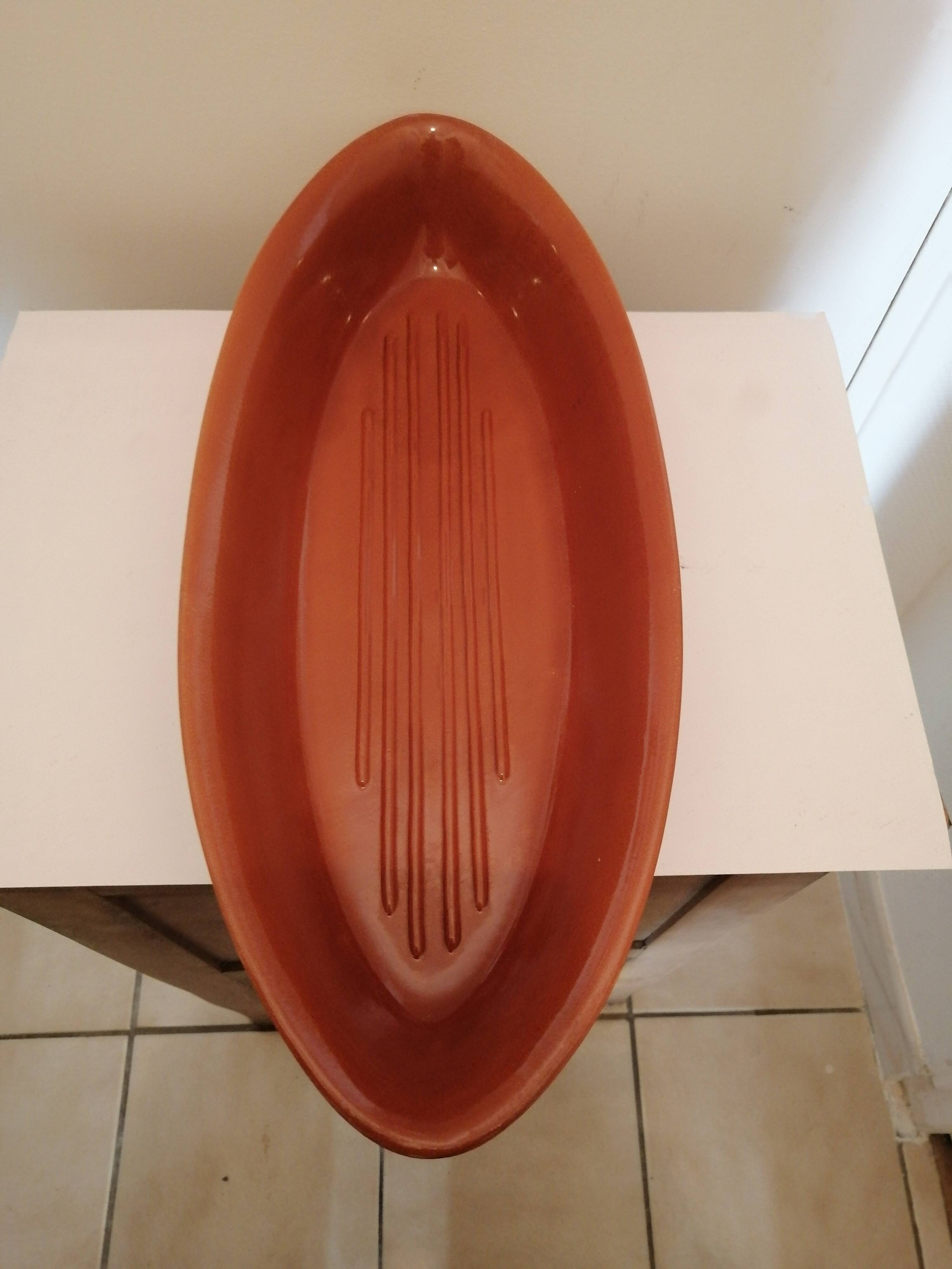 Fish shaped terracotta cooking dish