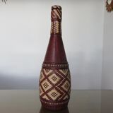 Ethnic bottle in leather 60s-70s