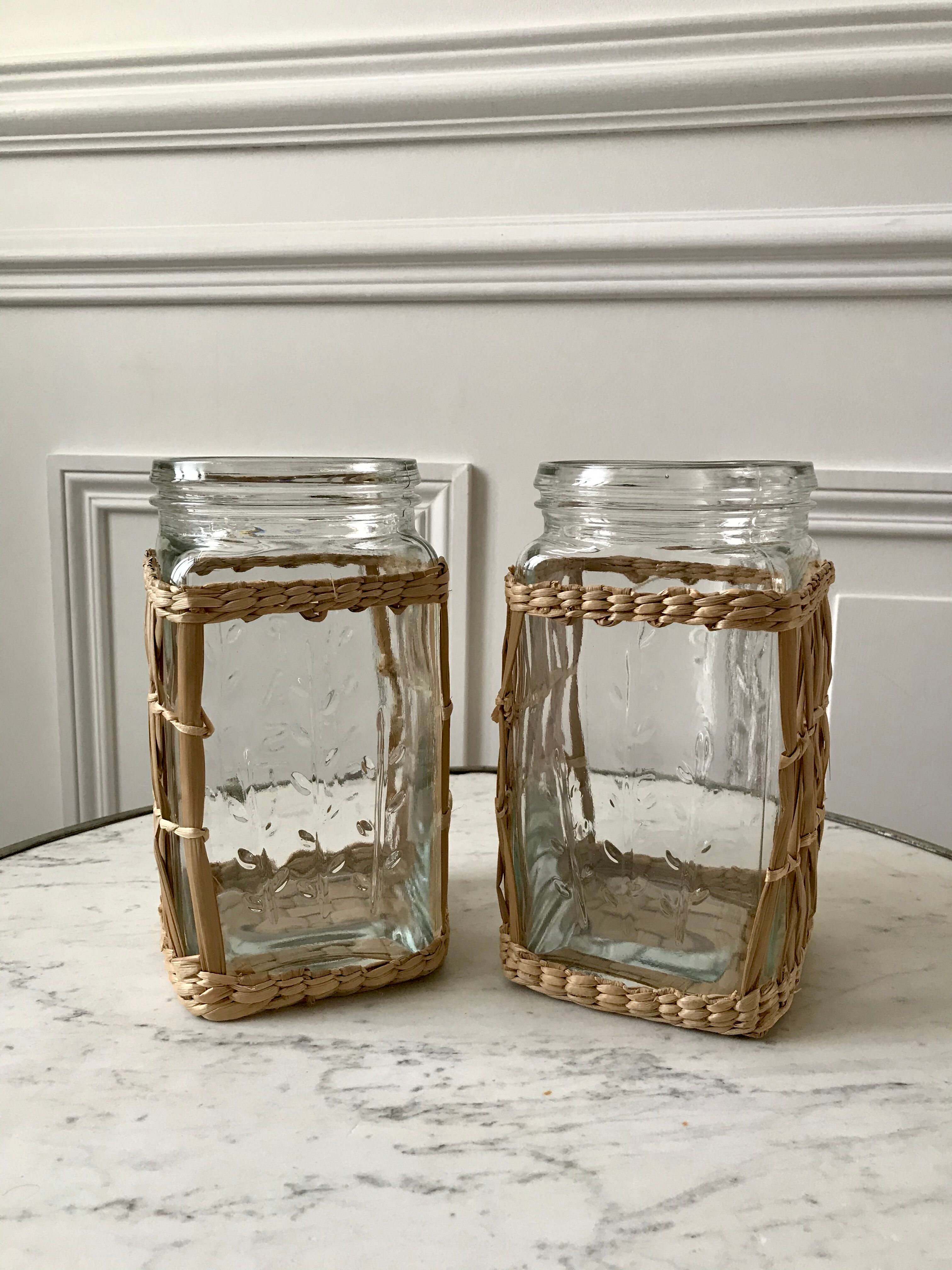 Duo of glass jars surrounded by vintage bamboo
