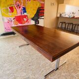 Desk that can serve as a dining table.