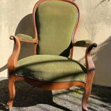 Fauteuil Voltaire XIX ème siècle, en noyer d'époque Louis Philippe, récemment recouvert.