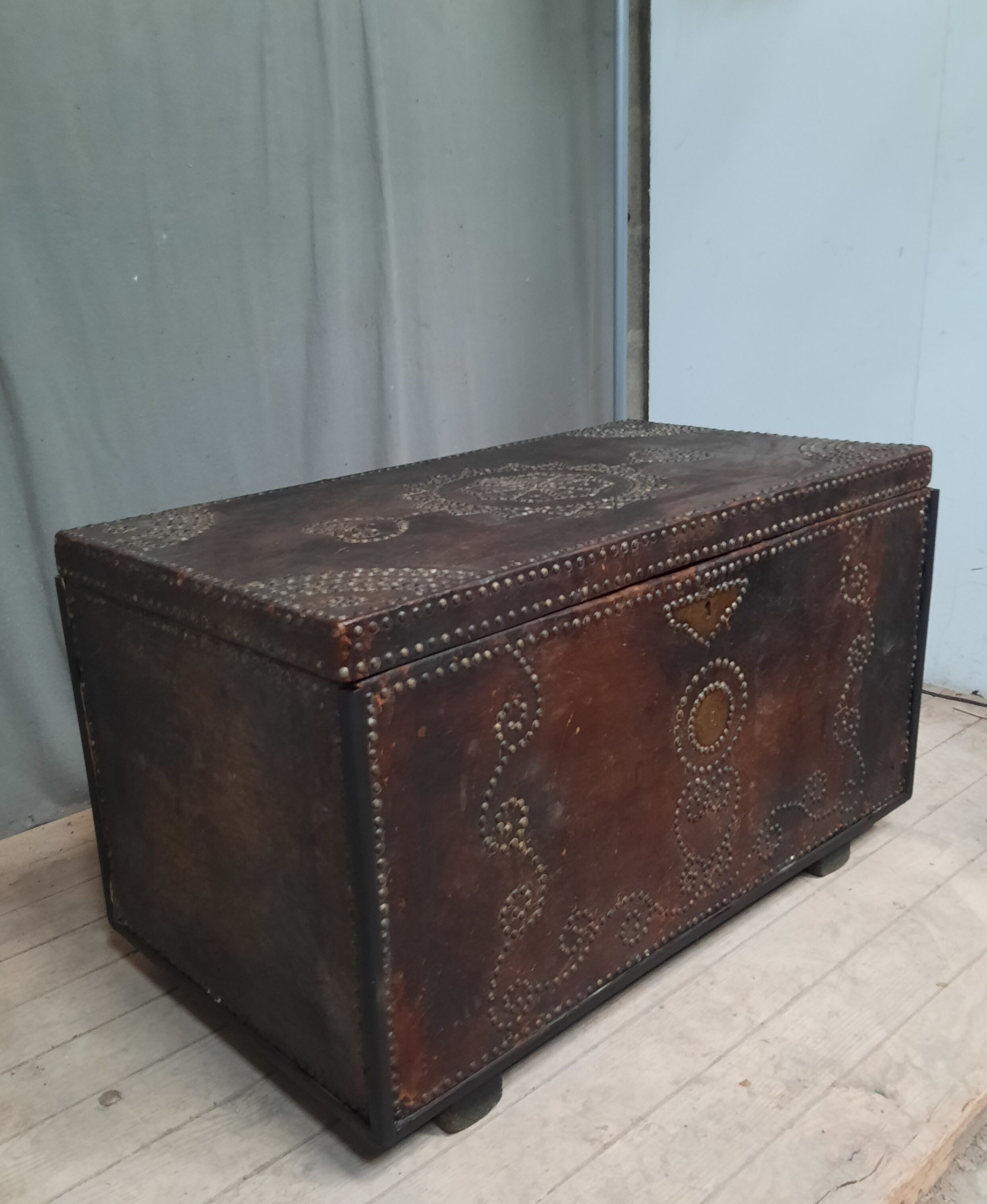 Chest covered with leather and nails