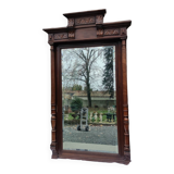 Old large carved wooden mirror