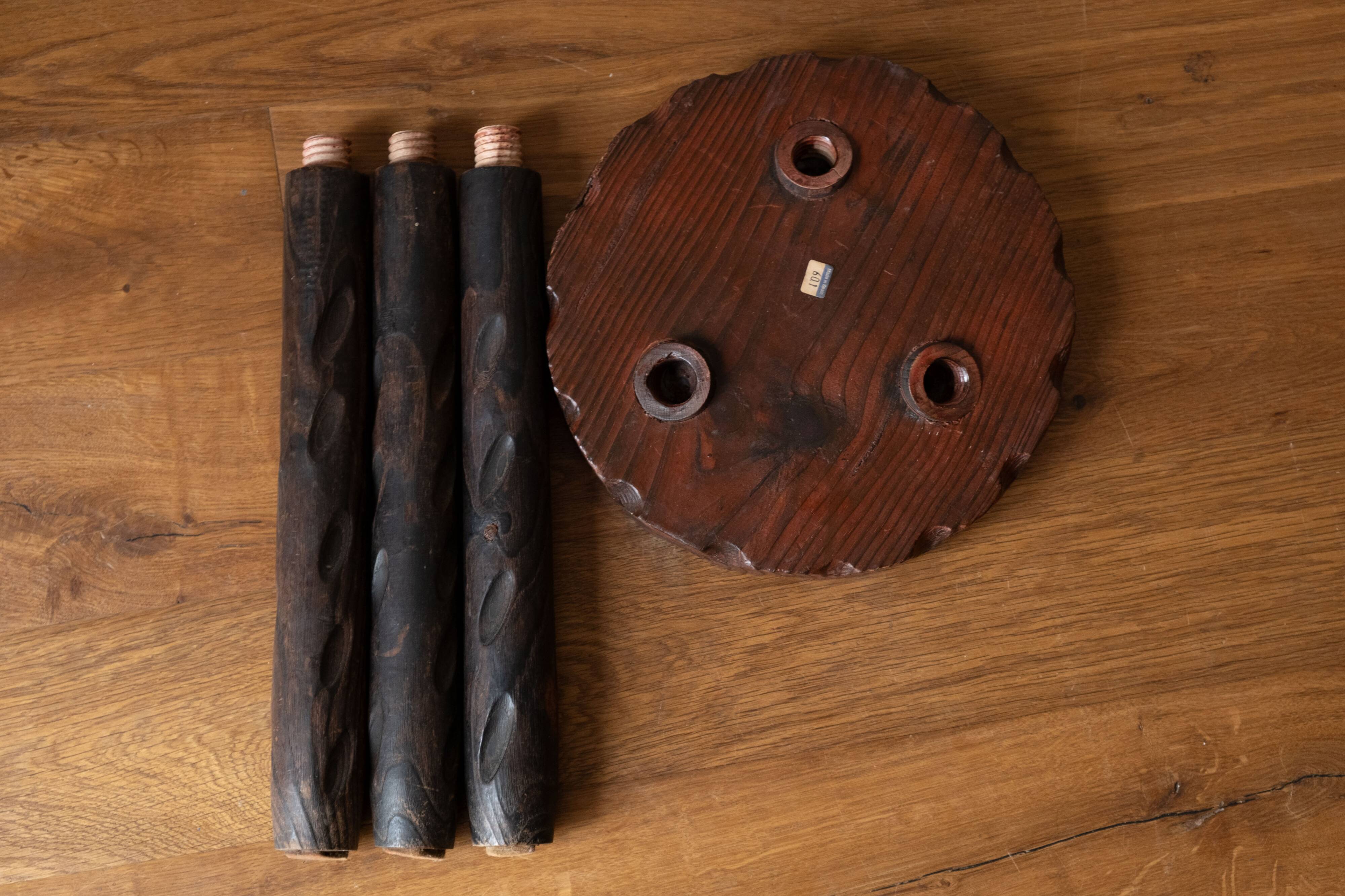 Set of two vintage round tripod stools, wooden farm stools.