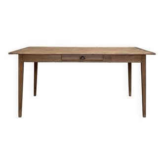 Vintage farm table with spindle legs.