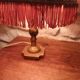 Vintage lamp, pink fringed pagoda shade and brass base.