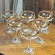 Champagne coupes or cocktail glasses with gilding