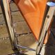 Vintage magazine holder from the 70s chrome metal and tan imitation leather
