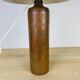 Stoneware bottle lamp and vintage wool lampshade