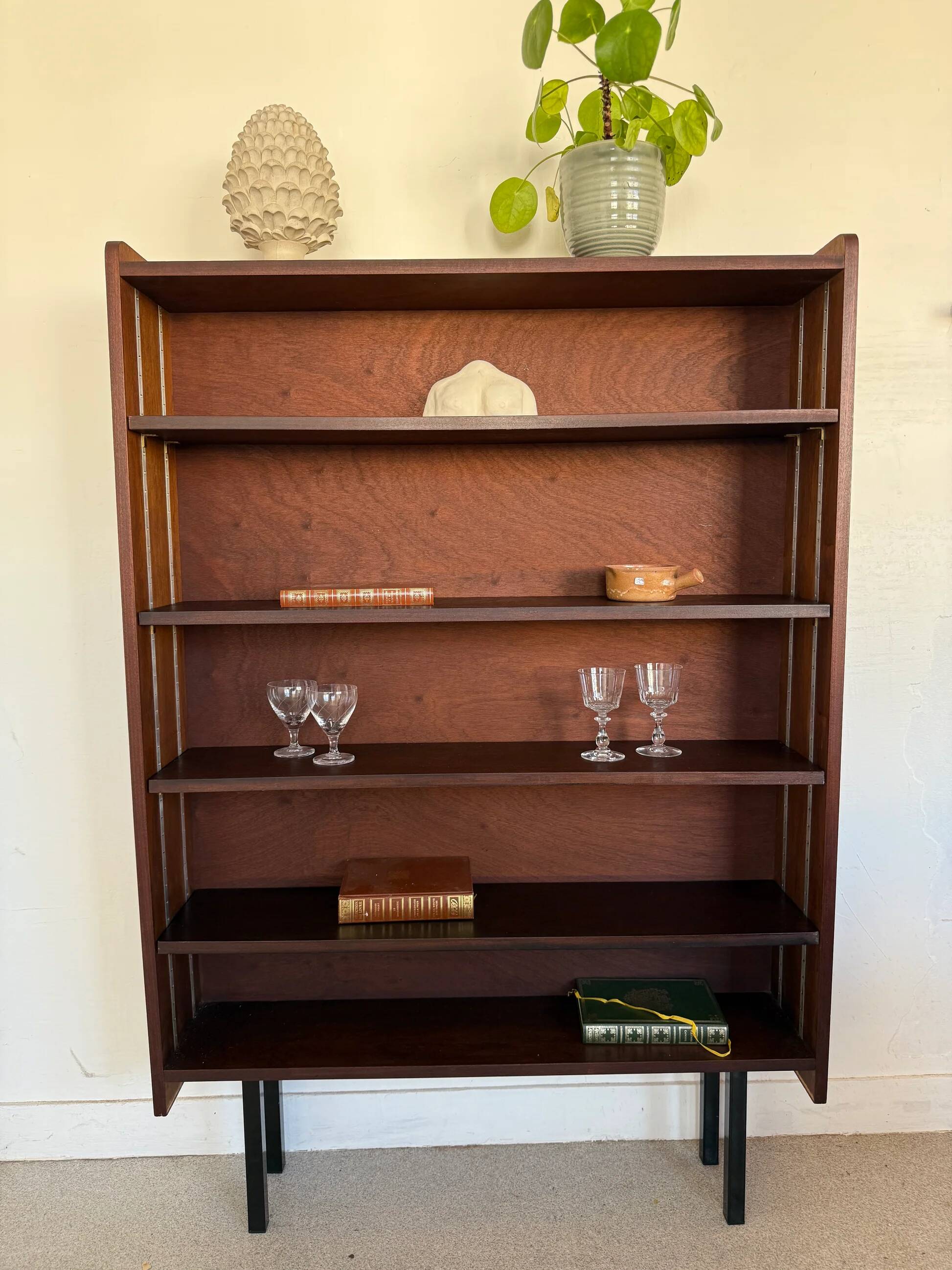 Vintage veneer bookcase with metal legs