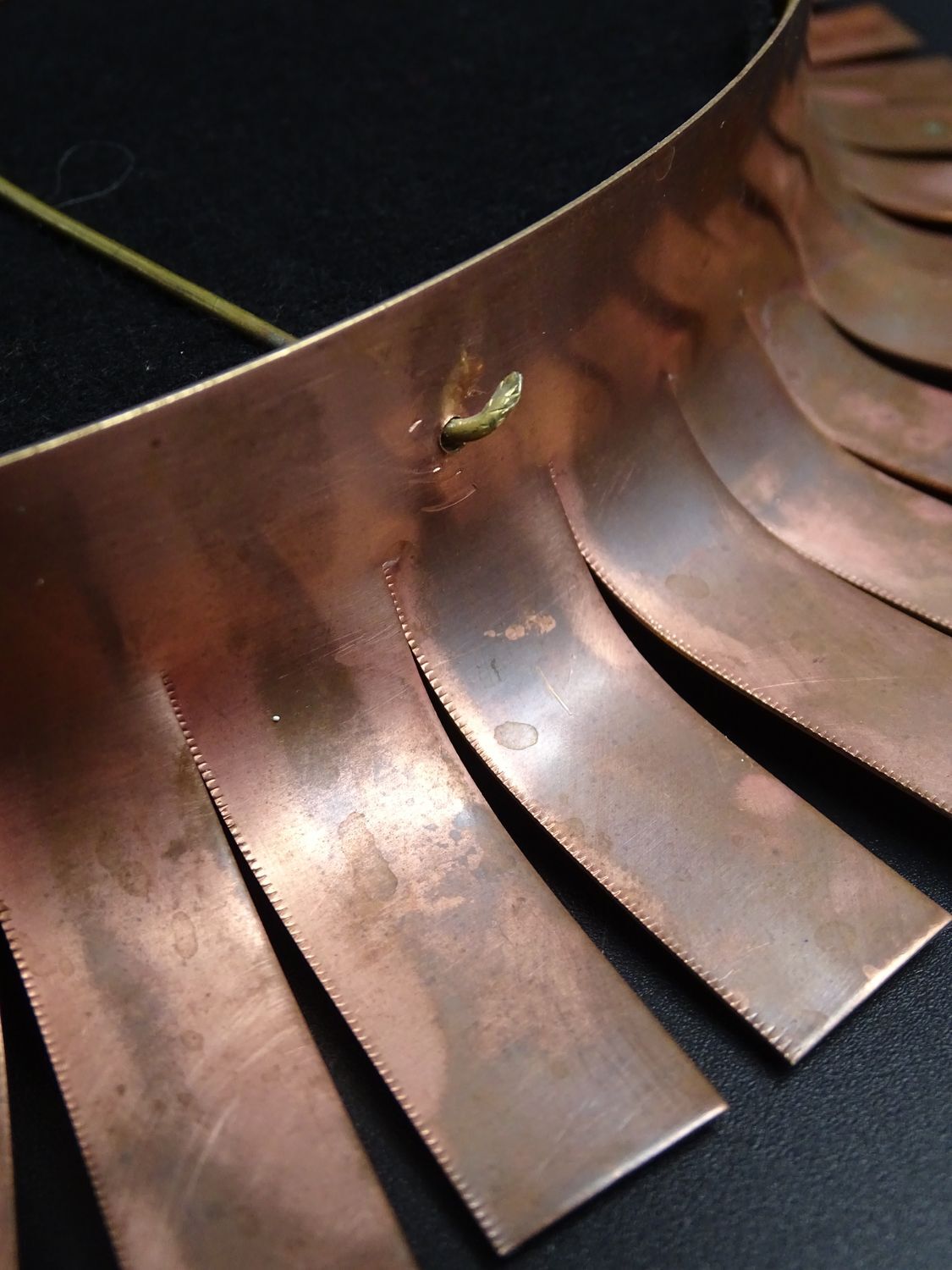 Round mirror in cut copper, sun-shaped  1970