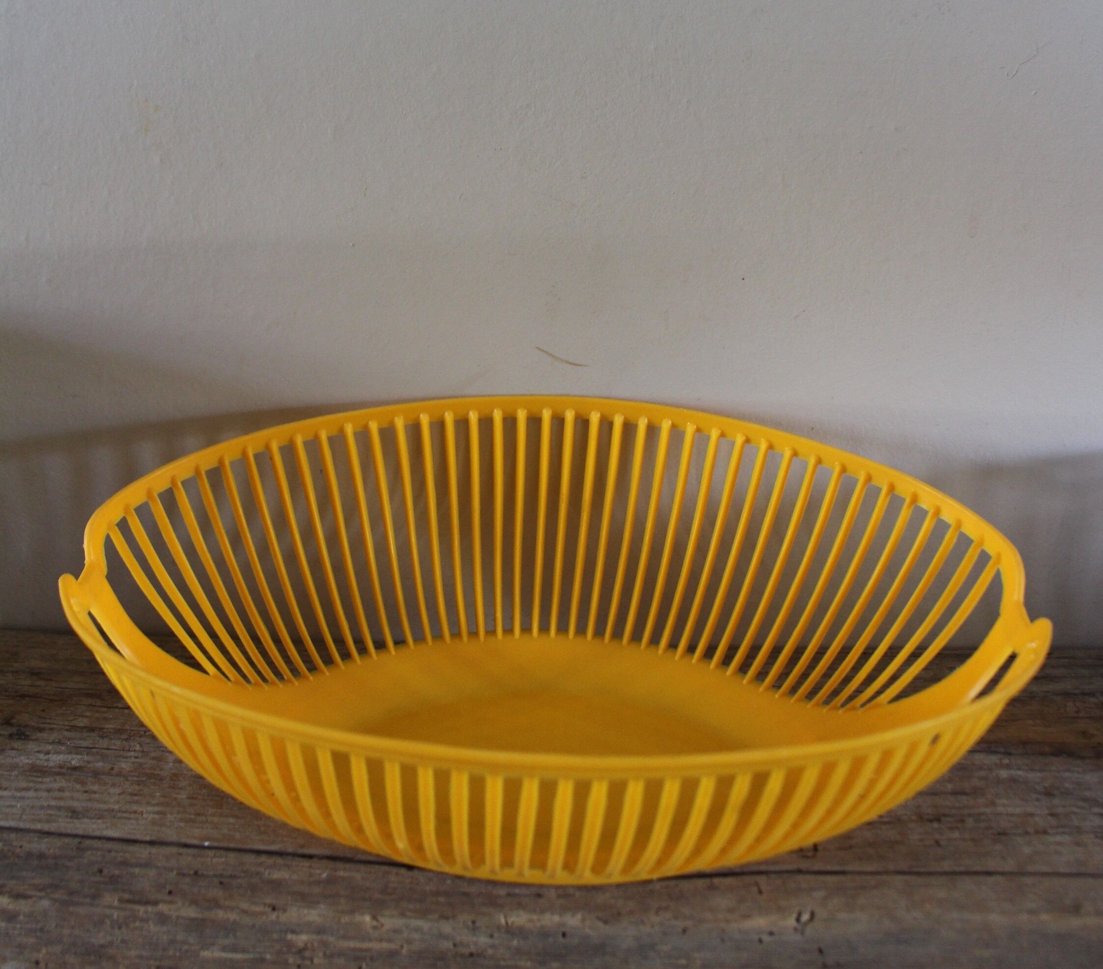 Vintage plastic orange yellow oval basket