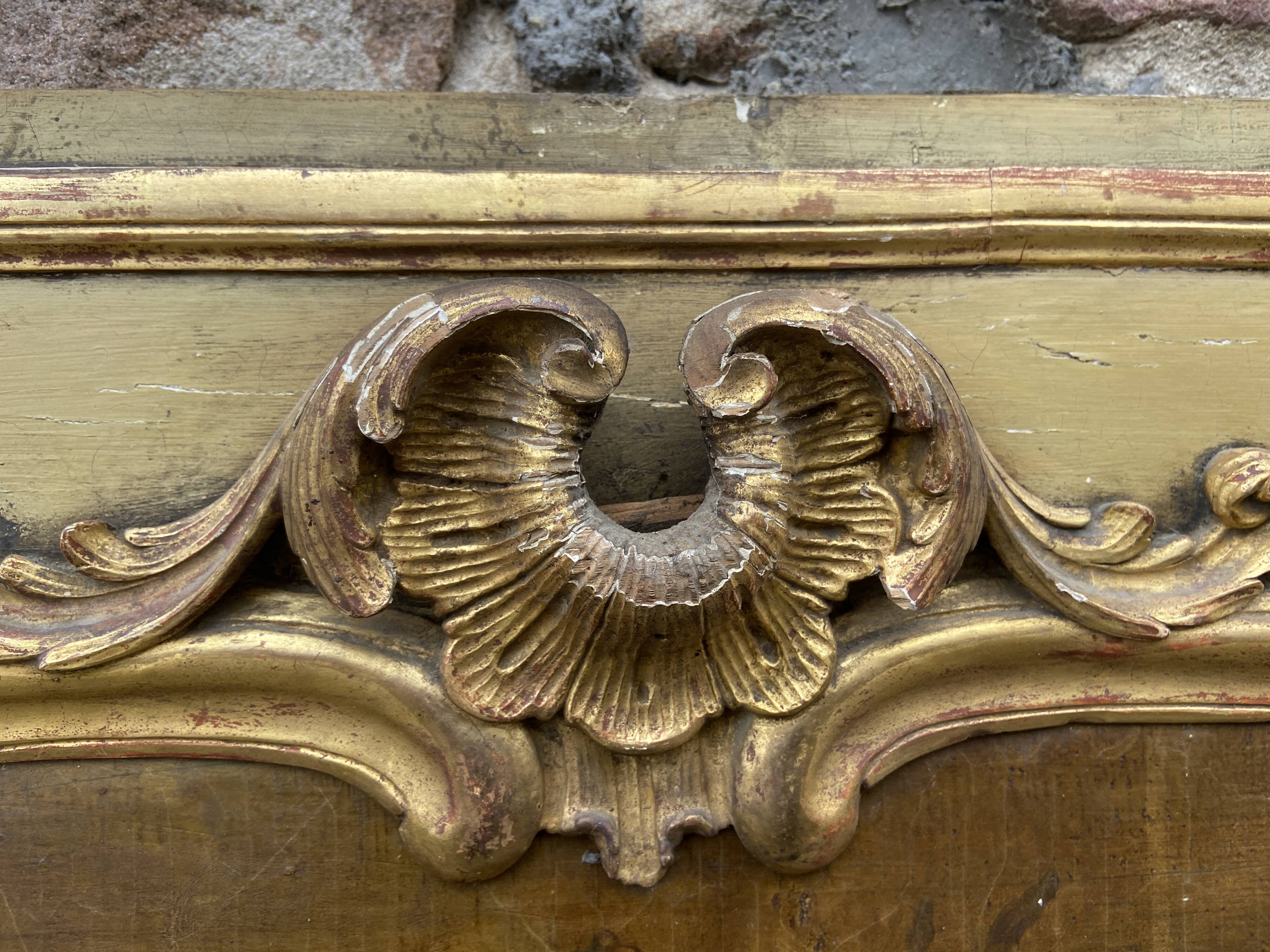 Trumeau & early 19th century painting in gilded wood.