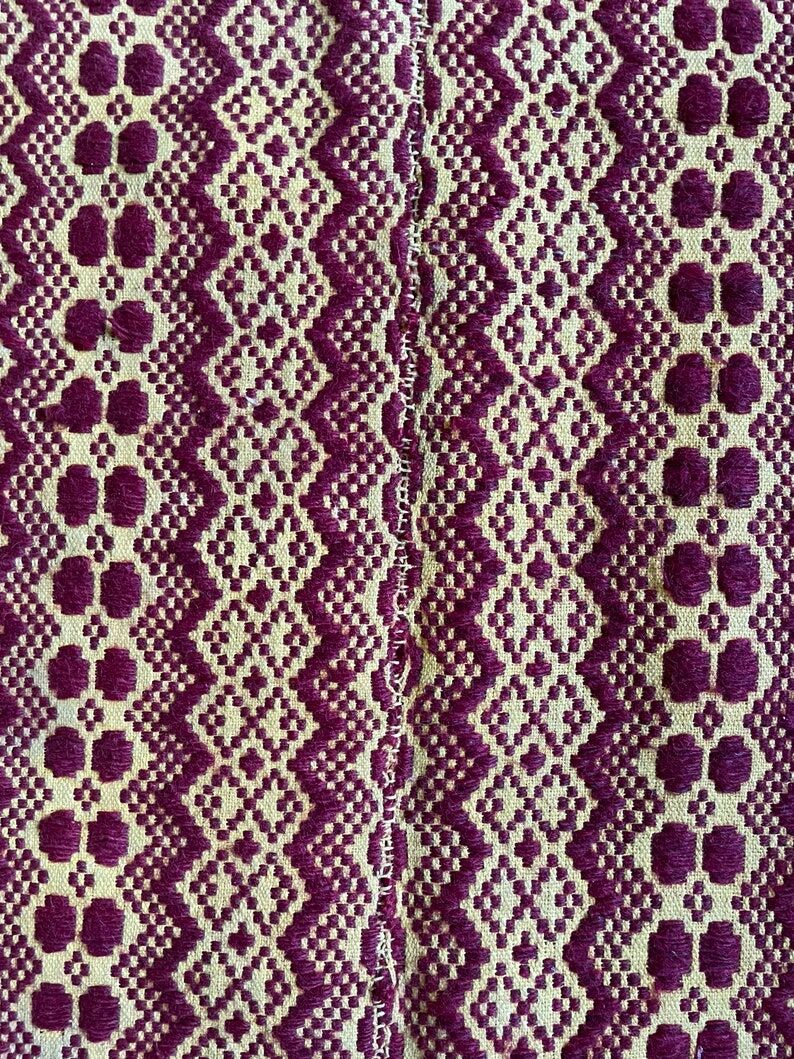Romanian vintage carpet brown design on a yellow background