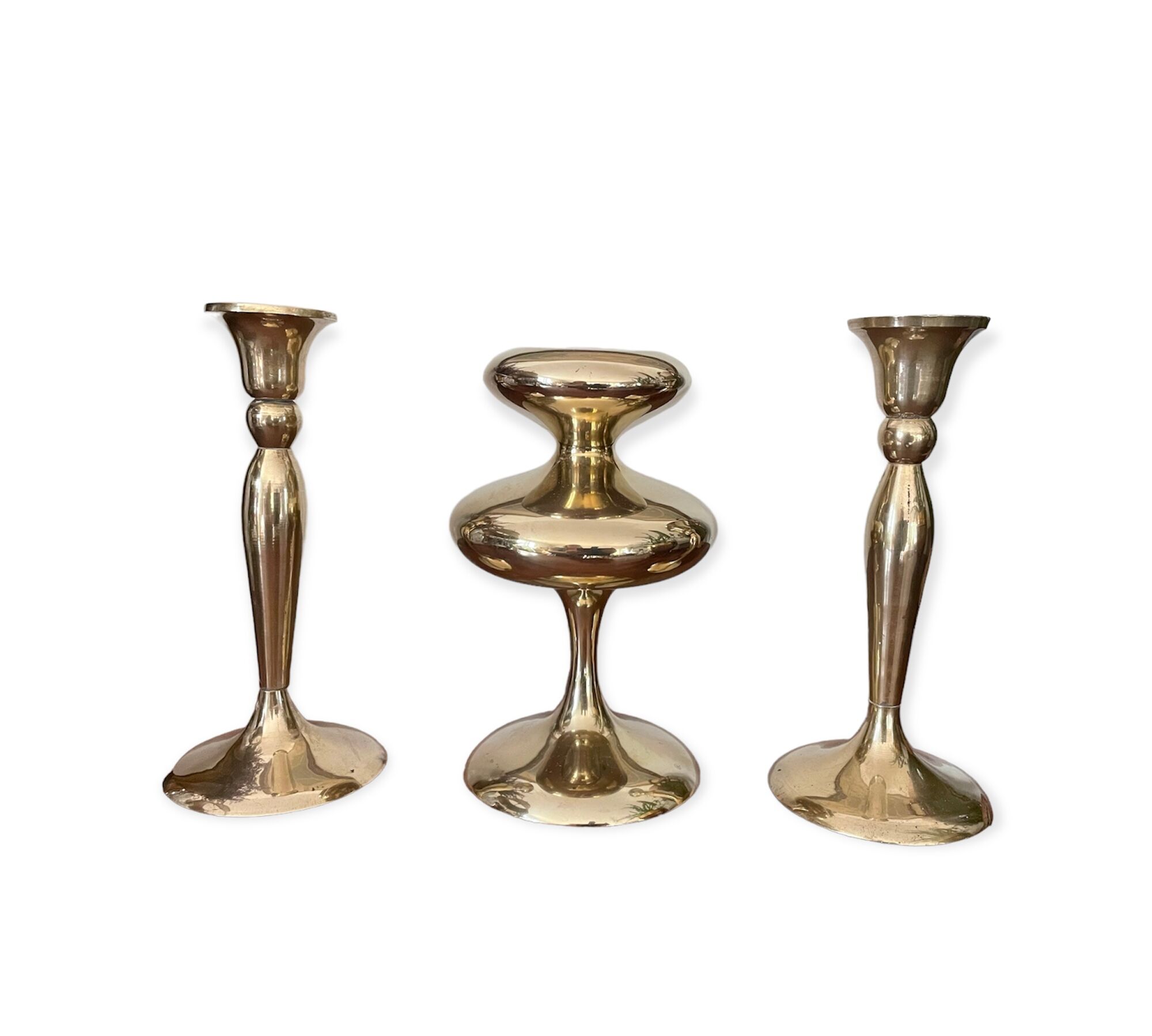 Three vintage brass candle holders