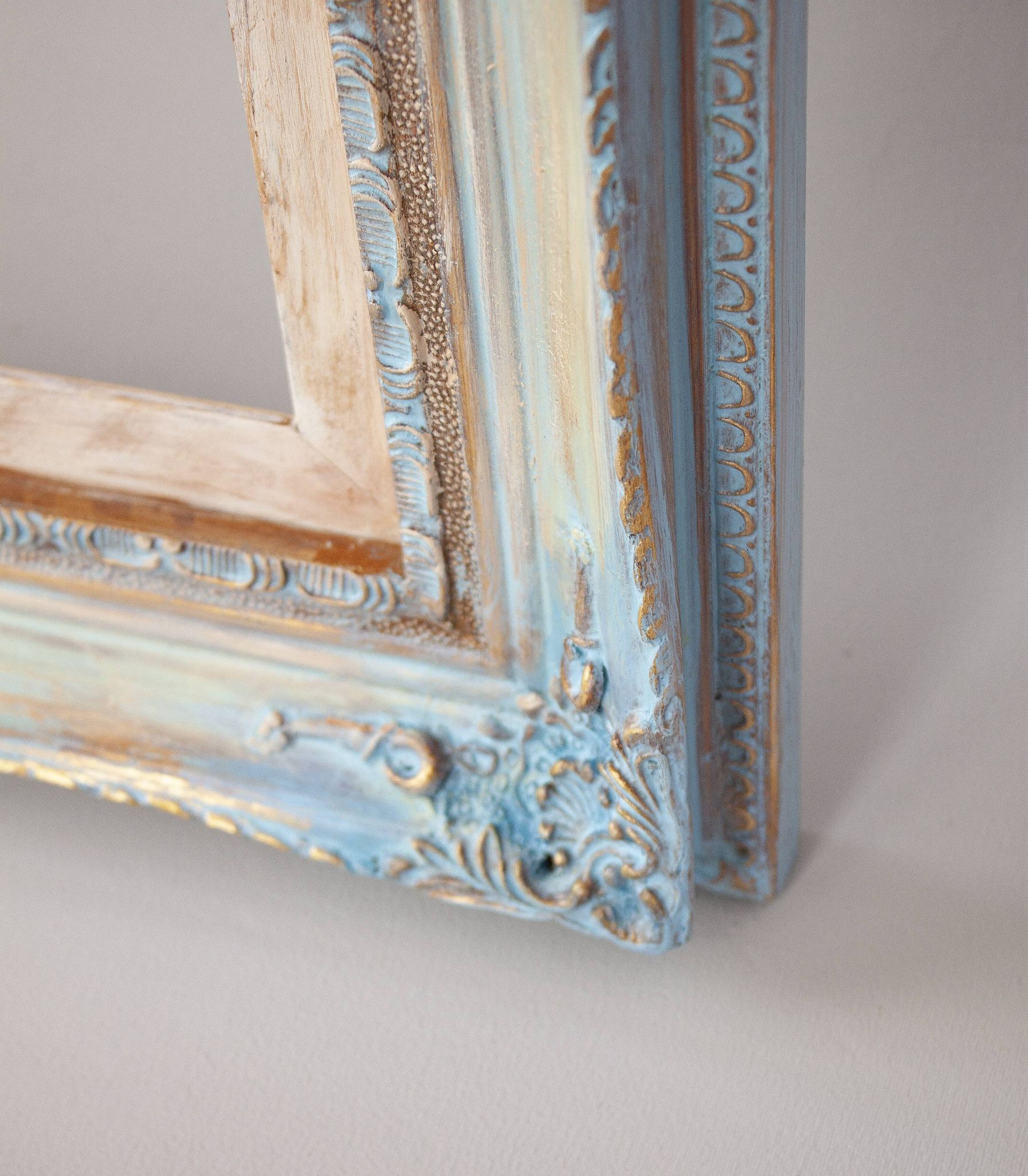Wooden frame in Louis XV style. Baroque frame. Style of the frame.