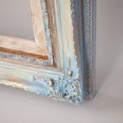 Wooden frame in Louis XV style. Baroque frame. Style of the frame.