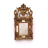 Regency style beaded mirror in carved and gilded wood, early 19th century