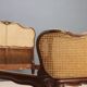 Simple bed in Barocchetto style in walnut.