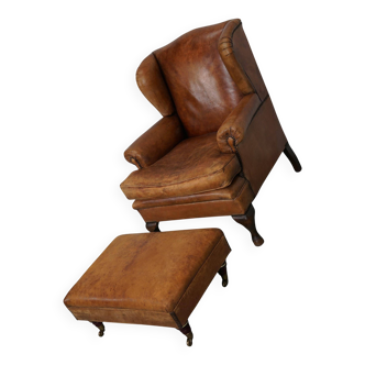 Fauteuil club vintage hollandais en cuir couleur cognac, avec repose-pieds