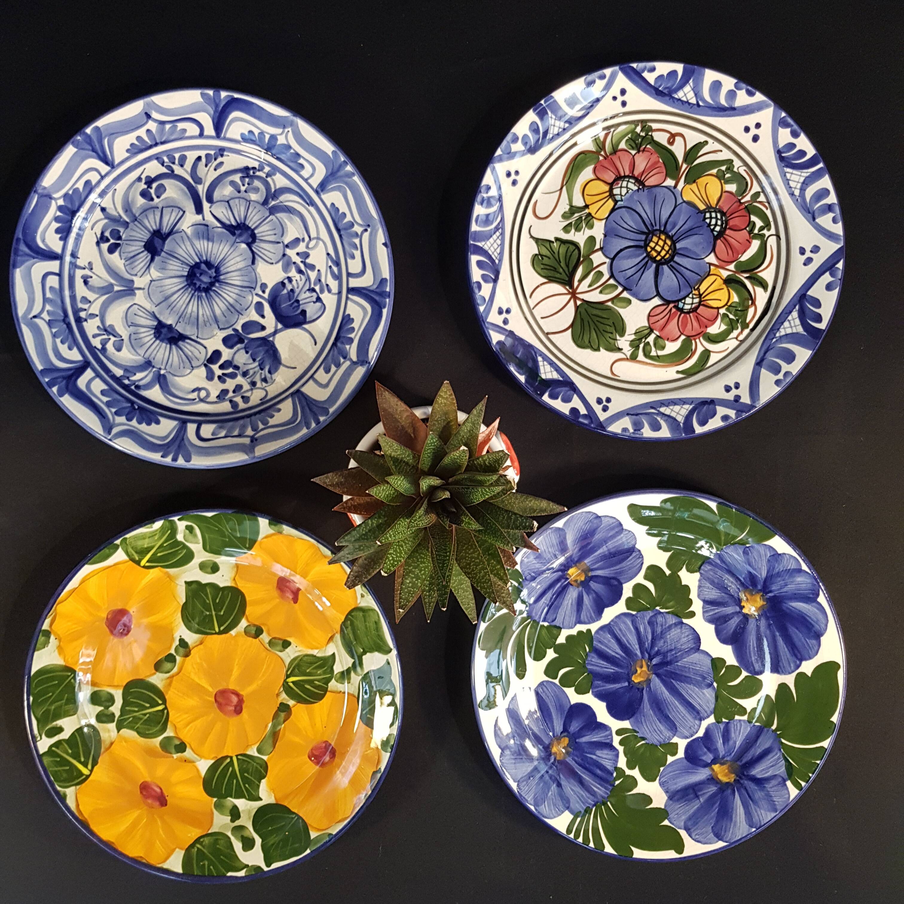4 decorative earthenware plates