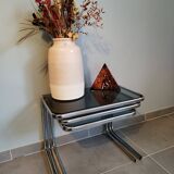Set of 3 nesting tables with chrome metal legs and smoked glass from the 70s