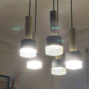Vintage cascading chandelier from the 60s-70s in black metal and brass