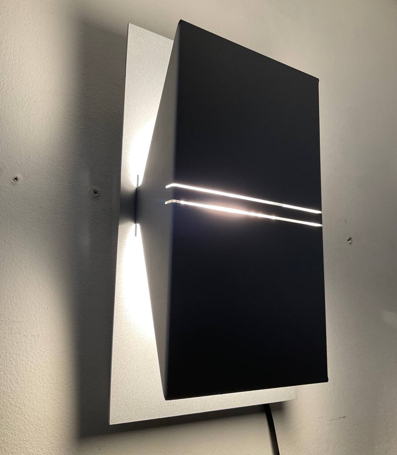 Pair of designer wall lights from the 80s-90s